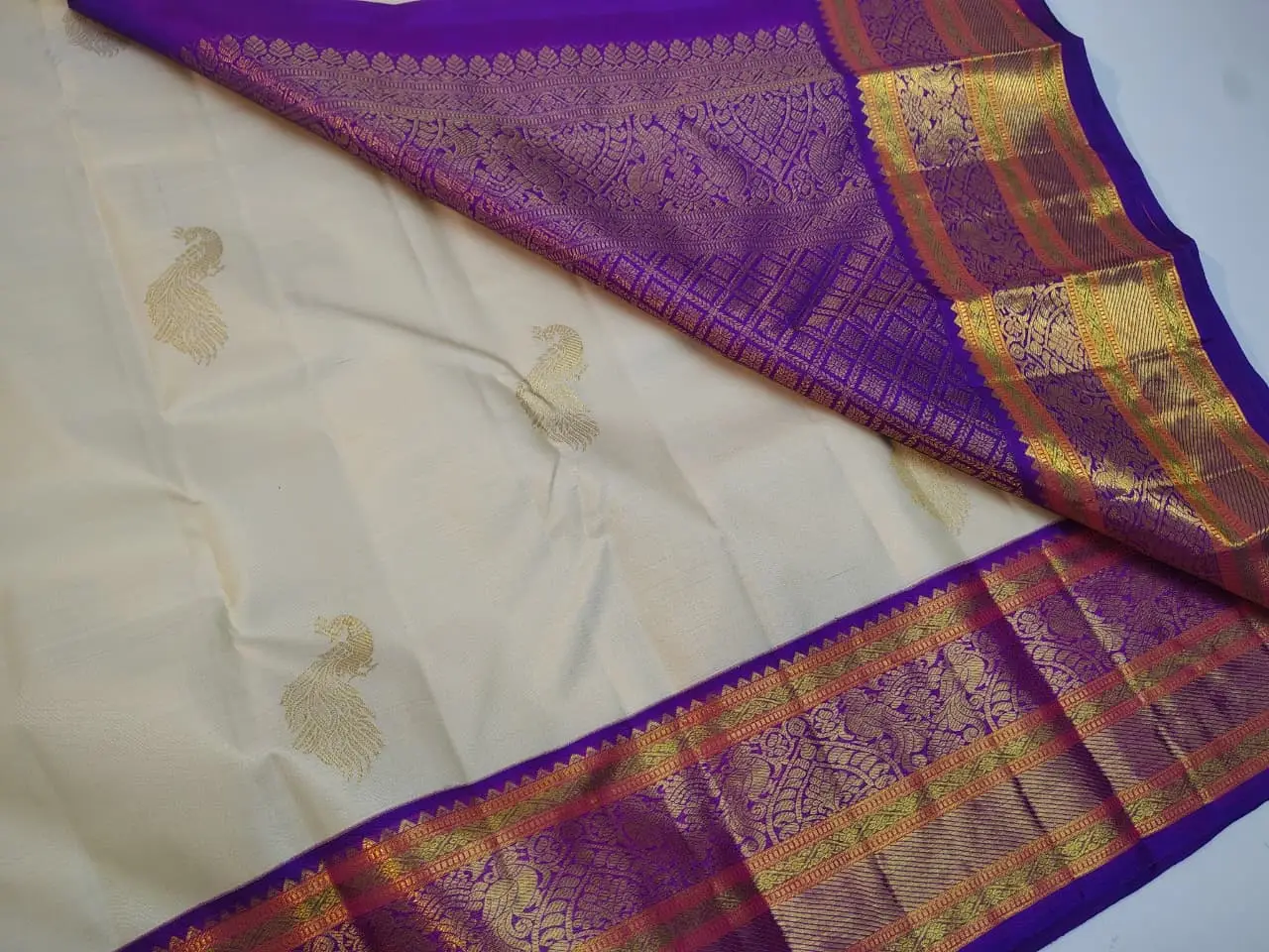 Purple Peacock Zari Border and Woven Motifs Saree